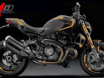 Monster 1200 gold auf grauer Maschine